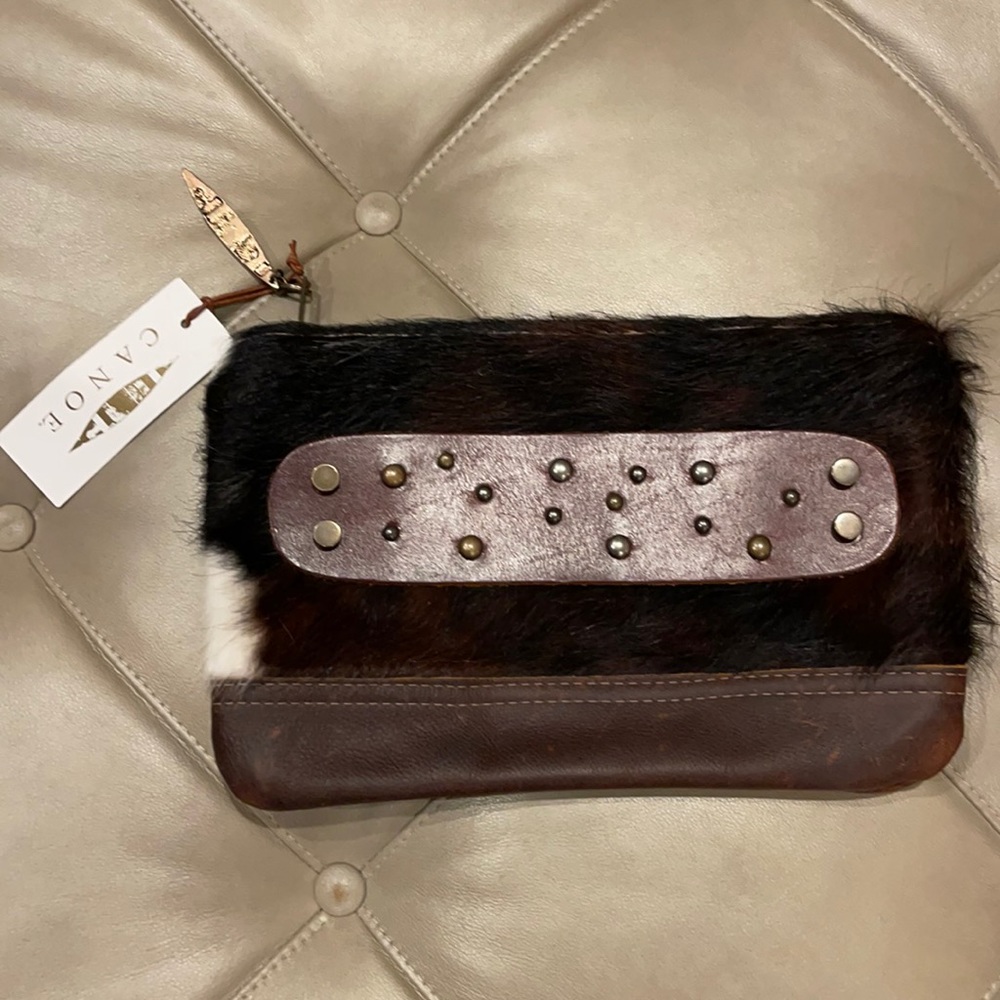 Canoe Tonto Grip with studs leather bag